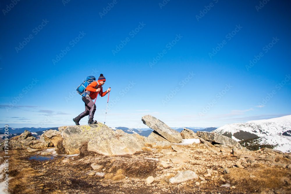Mountaineer with a backpack.