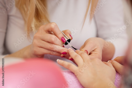 Nail Polishing. Manicure Treatment. Close up.
