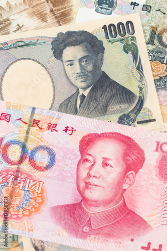 Japanese Yen and Chinese Yuan banknote money