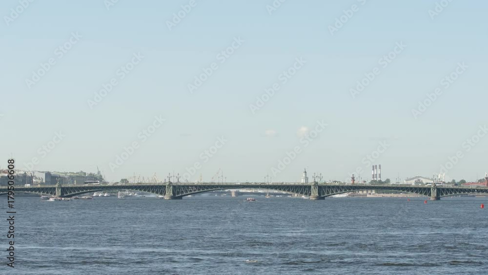Wide shot of the Trinity (Troitsky) bridge on the Neva river in the summer - St Petersburg, Russia Wide shot of the Trinity (Troitsky) bridge on the Neva river in the summer - St Petersburg, Russia