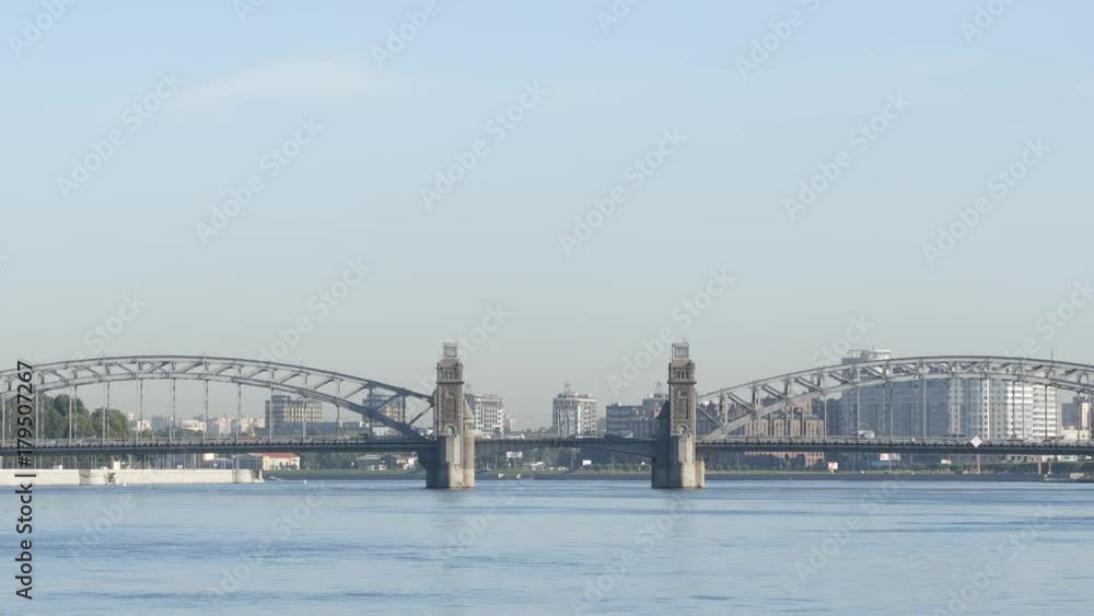 Cityscape: Peter the Great Bridge on the Neva river in the summer - St Petersburg, Russia Cityscape: Peter the Great Bridge on the Neva river in the summer - St Petersburg, Russia