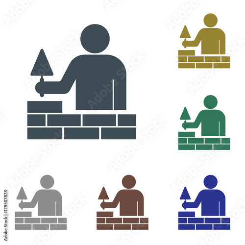 Brick layer tiler mason worker with trowe