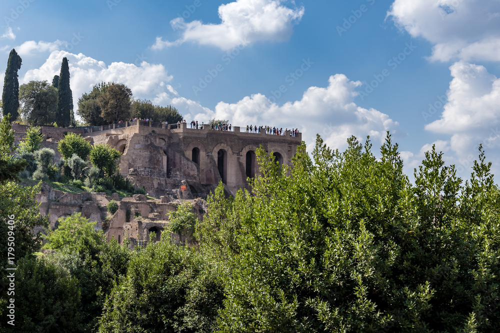 Scenic view of the antique Imperial Palace on Palatine hill, Rome, Italy. Archaeological site of ancient ruins viewed from Forum Romanum.