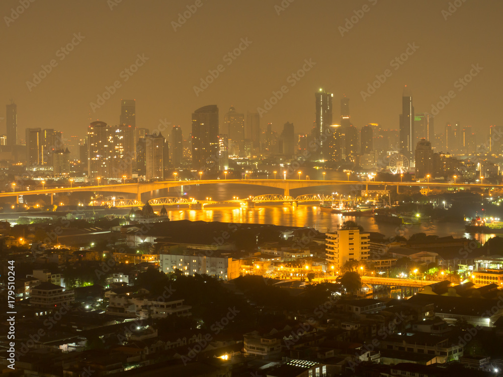 Bangkok river side cityscape. Bangkok night view in the business district. at twilight.Panorama view of Bangkok cityscape at night time. vintage colour tone 