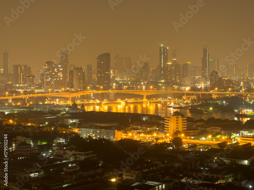 Bangkok river side cityscape. Bangkok night view in the business district. at twilight.Panorama view of Bangkok cityscape at night time. vintage colour tone  © anon