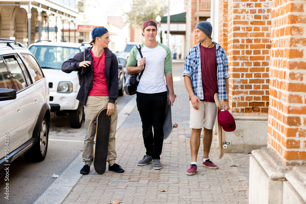 Teenage friends walking at the street