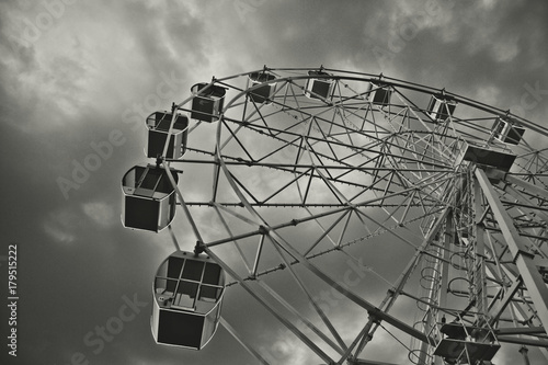 A large Ferris wheel, a black and white photo.