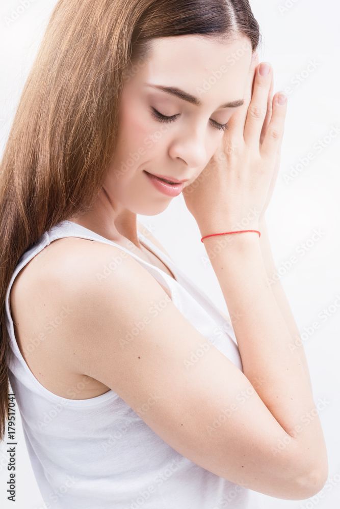 Beautiful young happy caucasian woman playing with healthy long hairs fashion beauty concept