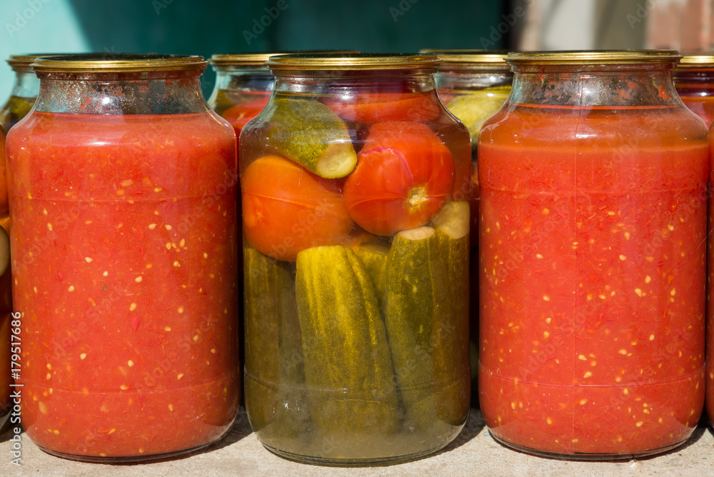 Jars with variety of pickled vegetables. Preservation Jars with variety of pickled vegetables. Preservation