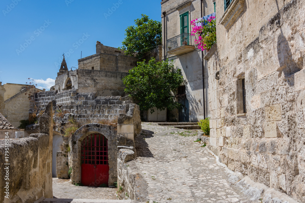 Typical alley with stairs of Matera old town, UNESCO World Heritage Site and European Capital of Culture 2019, Matera, Basilicata, Italy