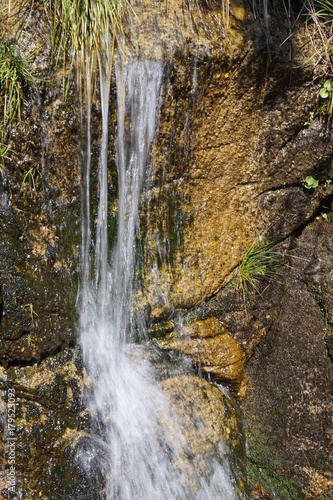 Nature in High Tatras in Slovakia. Mountains of rocky rocks cliffs and waterfalls suitable as background pictures of wishes, banners.