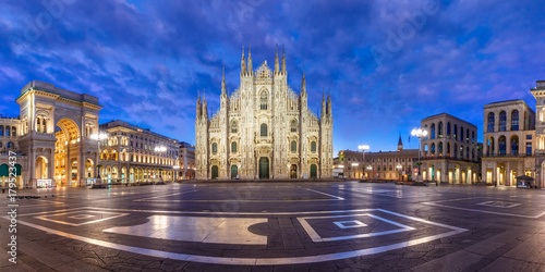 Panorama of the Piazza del Duomo, Cathedral Square, with Milan Cathedral or Duomo di Milano, Galleria Vittorio Emanuele II and Arengario, during morning blue hour, Milan, Lombardia, Italy photo