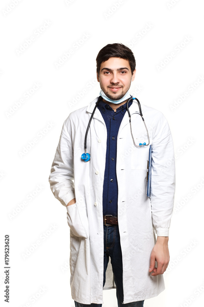 beautiful young doctor in a dressing gown with a stethoscope on a white background in the studio, beautiful young doctor in a dressing gown with a stethoscope on a white background in the studio,
