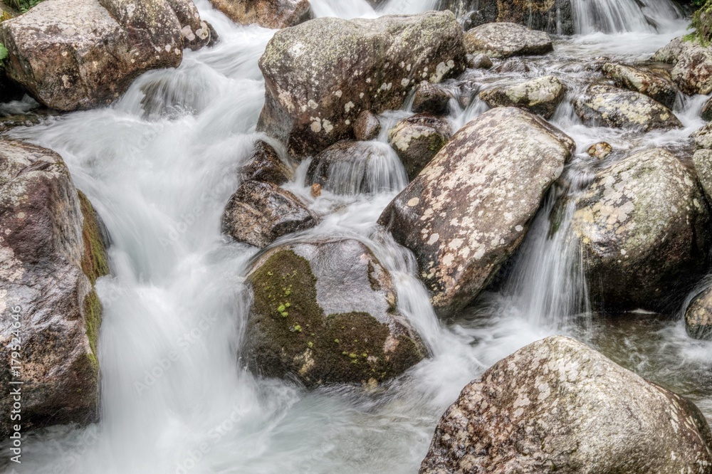Nature in High Tatras in Slovakia. Mountains of rocky rocks cliffs and waterfalls suitable as background pictures of wishes, banners. Nature in High Tatras in Slovakia. Mountains of rocky rocks cliffs and waterfalls suitable as background pictures of wishes, banners.