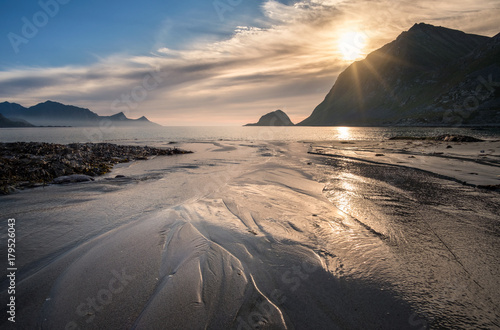 Scenic view from Haukland beach  Lofoten  Norway at summer evening with sunset