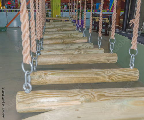 indoors , the logs on the ropes as an obstacle in the adventure Park