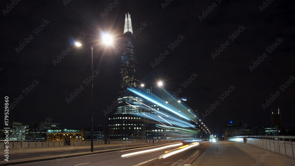 Traffic cars on London Bridge with The Shard in background, LONDON, ENGLAND, long exposure