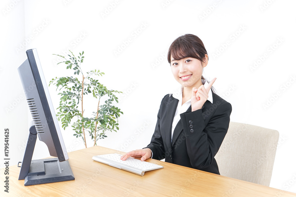 business woman pointing to something in office business woman pointing to something in office