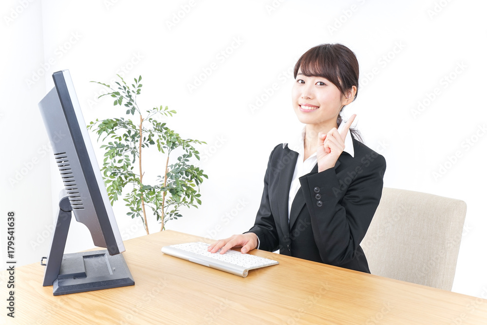 business woman pointing to something in office business woman pointing to something in office