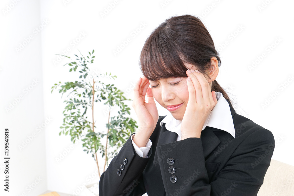 business woman suffering from headache business woman suffering from headache