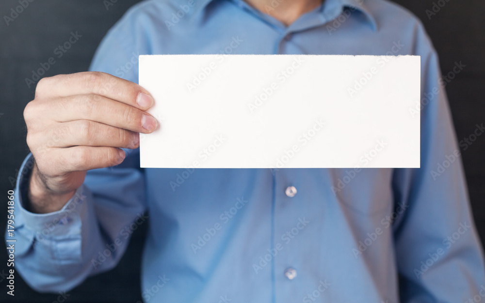 Man holding blank paper. Man holding blank paper.