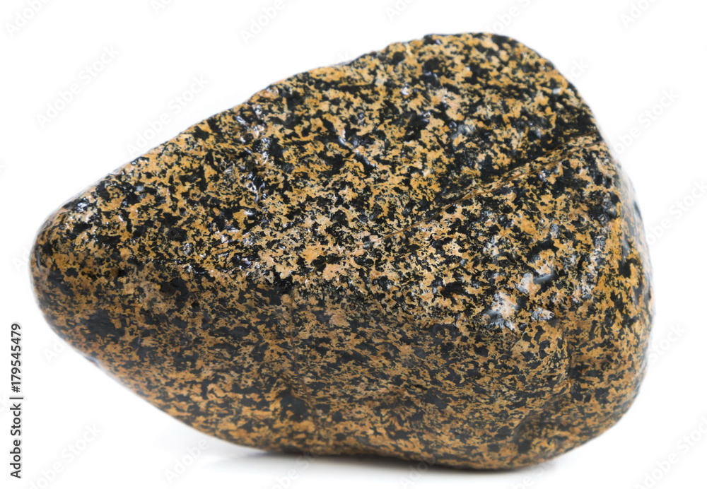 Single natural stone on white background, close-up Single natural stone on white background, close-up