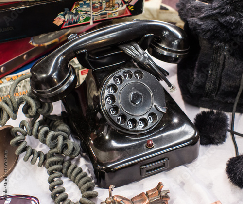 black vintage disk phone, for sale at the flea market