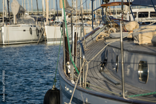 prow of a sailboat, sports marina area, Copy Space, background blurred of other ship docked