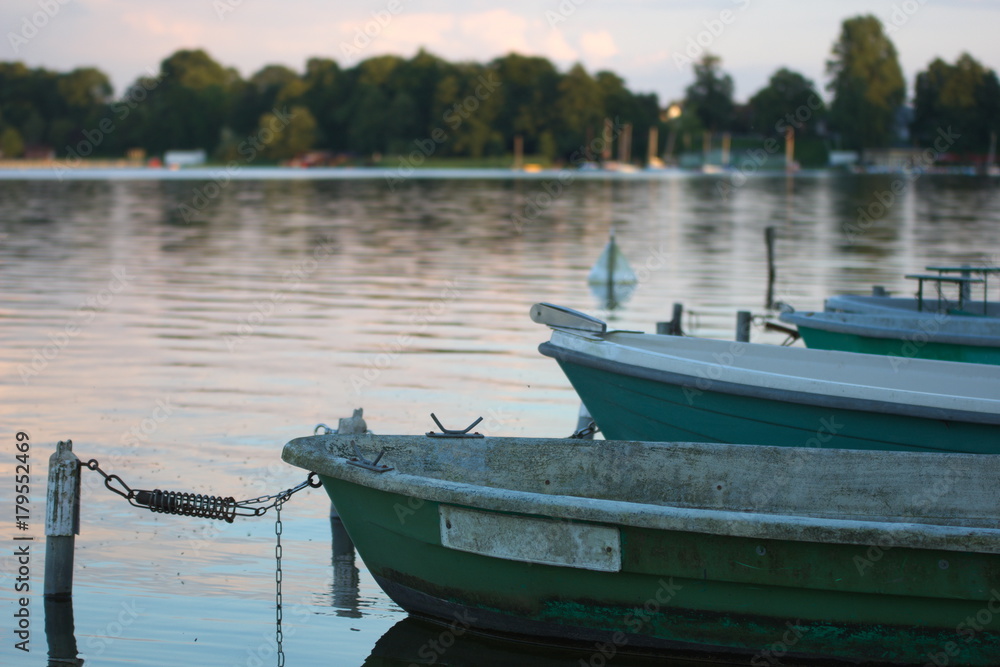 Boats outdoor in a park with a big lake