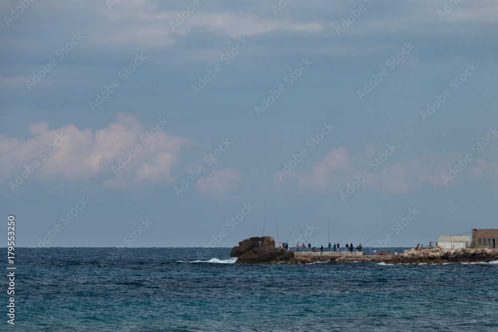 Anglers on pier, Mediterranean