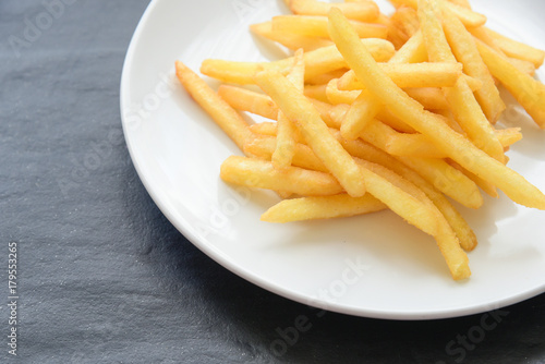 French fries on white dish