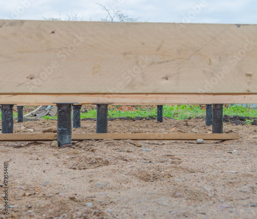 bottom view, on pile foundations hewn timber framing house