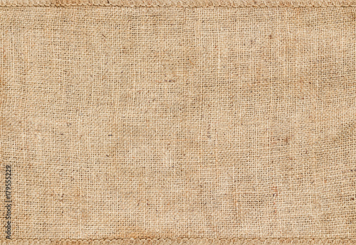 Background and texture of natural brown Sackcloth with Stitches Seam.