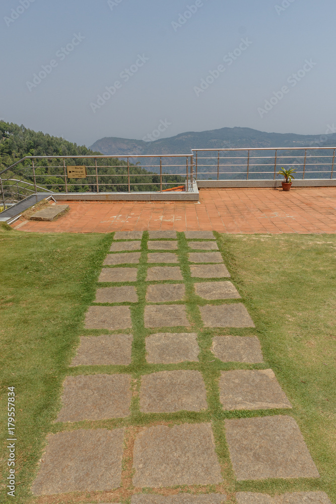 Top view of hill station from terrace with mountain view in the background  and stone floor in the foreground. Stock Photo | Adobe Stock