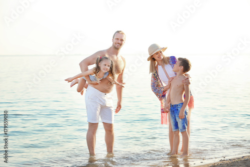 Happy family resting at sea...