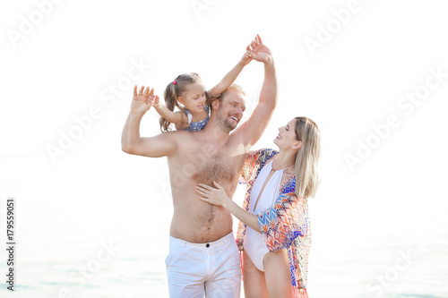 Happy family resting at sea...
