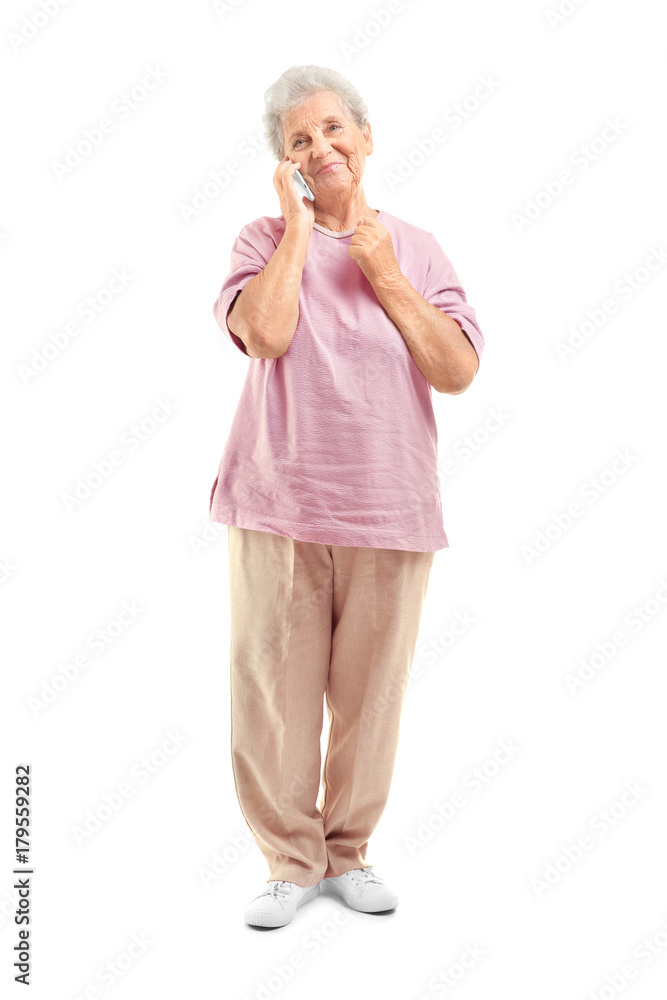 Elderly woman speaking on cell phone, isolated on white Elderly woman speaking on cell phone, isolated on white