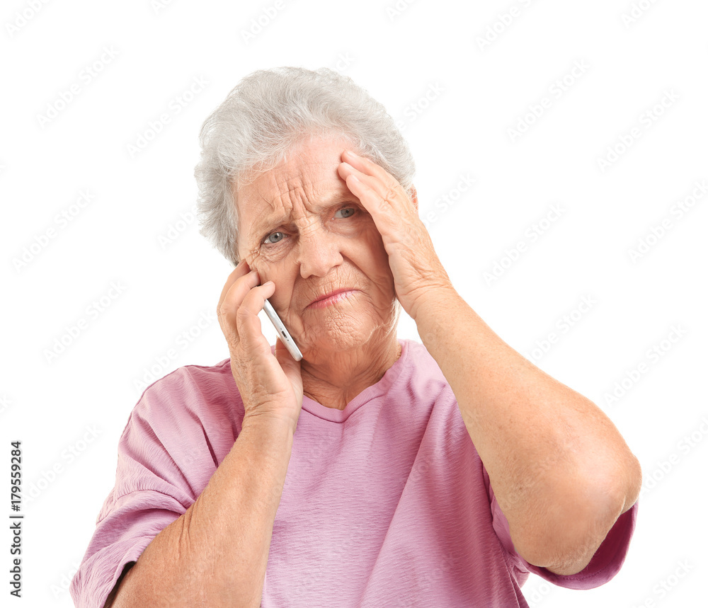 Elderly woman speaking on cell phone, isolated on white Elderly woman speaking on cell phone, isolated on white