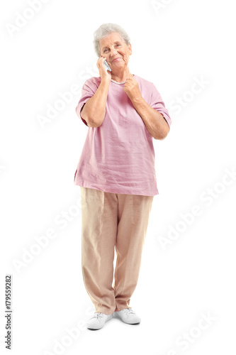 Elderly woman speaking on c...
