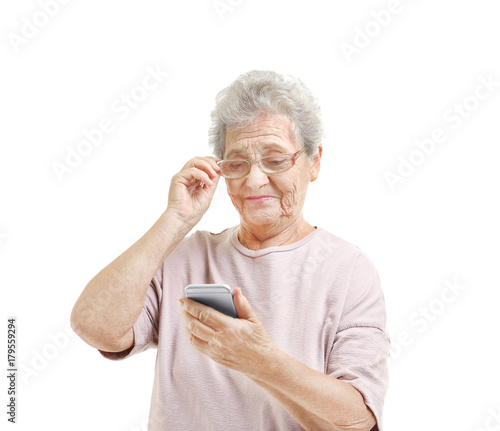 Elderly woman using cell ph...