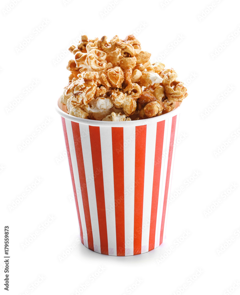 Cup with tasty caramel popcorn on white background Cup with tasty caramel popcorn on white background