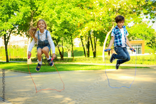 Cute little children jumpin...