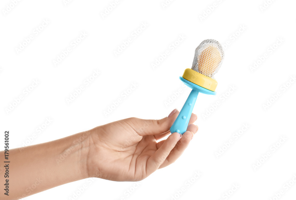 Woman holding baby's nibbler on white background Woman holding baby's nibbler on white background
