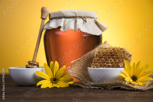 Fresh honey on wooden table