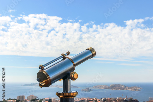 telescope at view point on mountain top in Marseille
