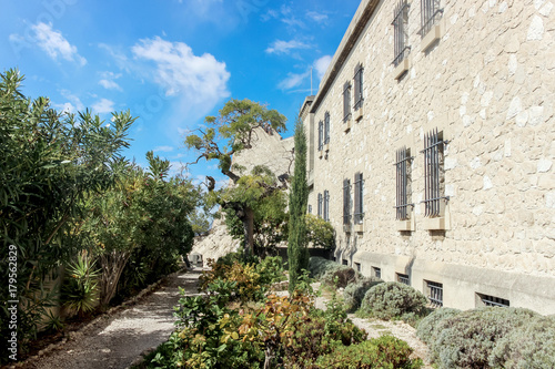 green garden at Notre-Dame de la Garde church in Marseille, France