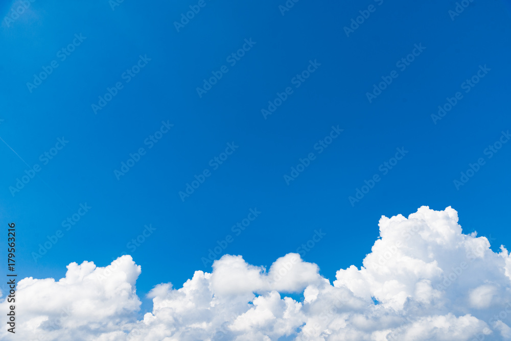White cloud and blue sky background image.