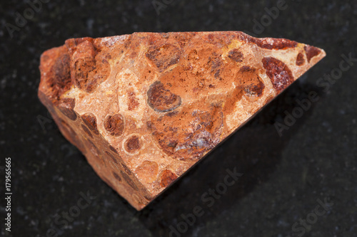 raw bauxite ore on dark background
