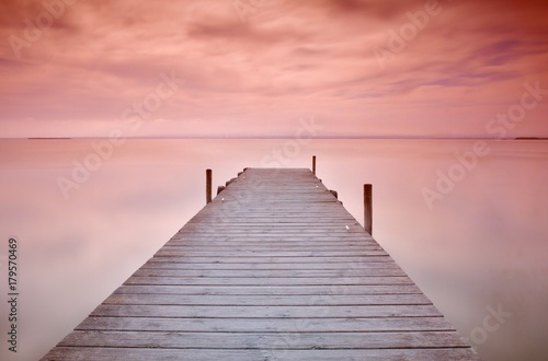 Wooden pier at sunset