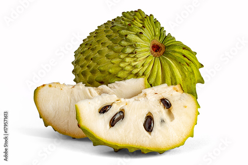 Cuadro en lienzo Guanabana useful lies on white background. Annona or milk apple